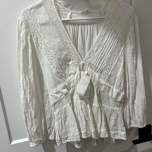 Low V Neck White Ruffled Blouse